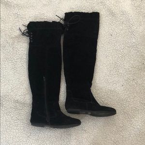 Thigh high black boots